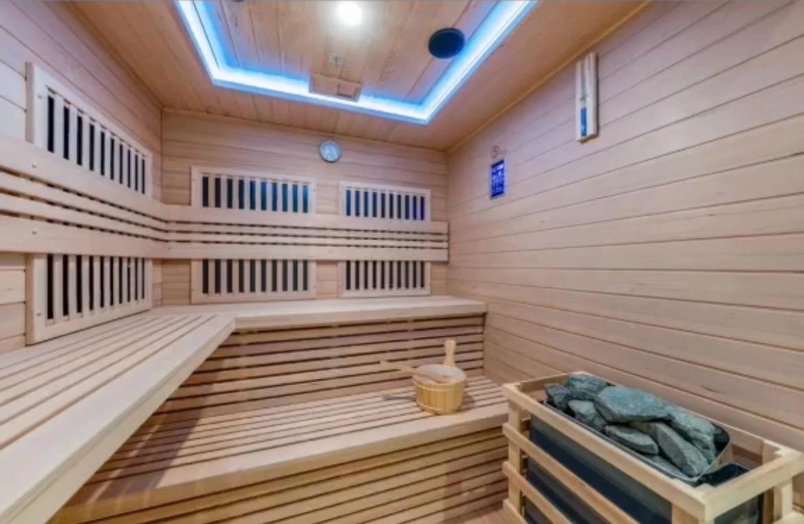 Traditional sauna with backlit ceiling at The Royal VVIP